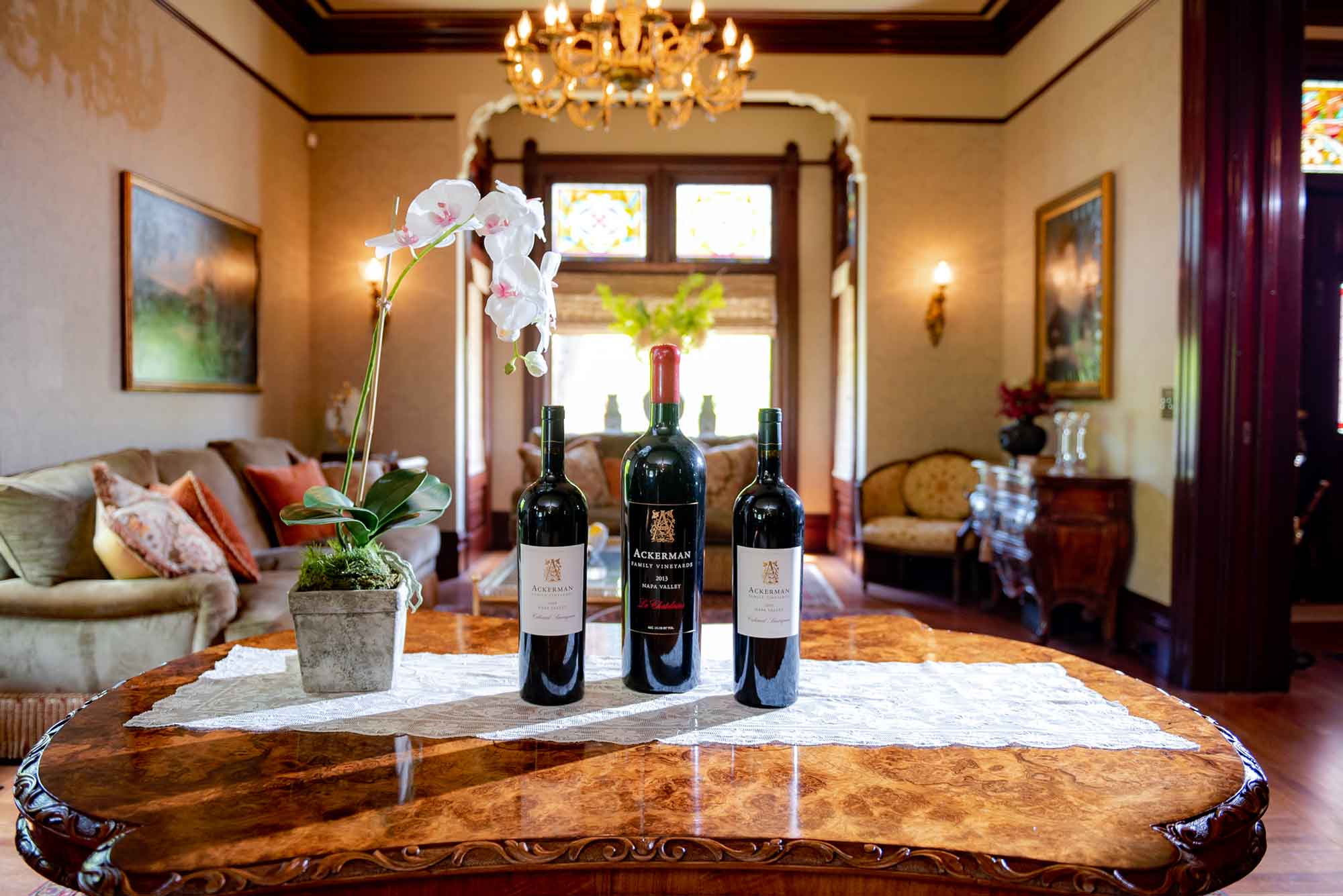 trio of Ackerman wines on a table